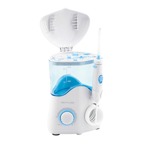 Ирригатор для полости рта REVYLINE RL 100, стационарный, емкость резервуара 0,6 л, 7 насадок, белый 456551 - МСК «Форвард»