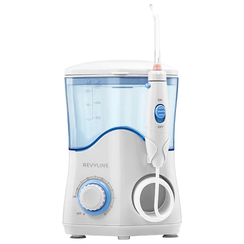 Ирригатор для полости рта REVYLINE RL 100, стационарный, емкость резервуара 0,6 л, 7 насадок, белый 456551 - МСК «Форвард»